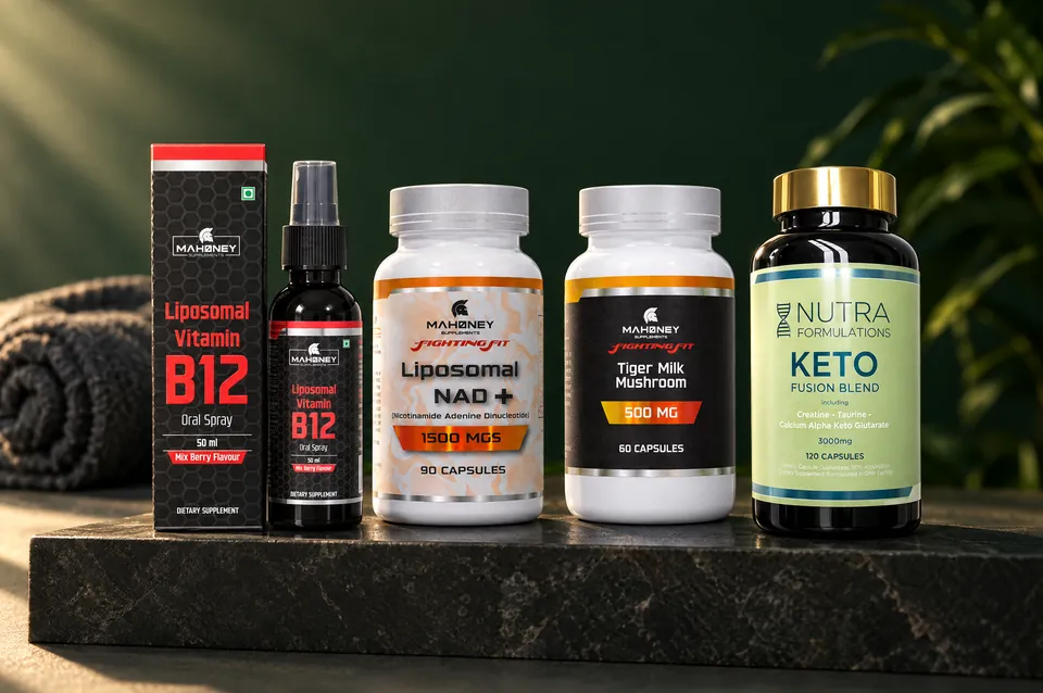 B12 spray, Liposomal NAD Plus, Tiger Milk Mushroom and Keto Fusion on a dark stone plinth at dawn