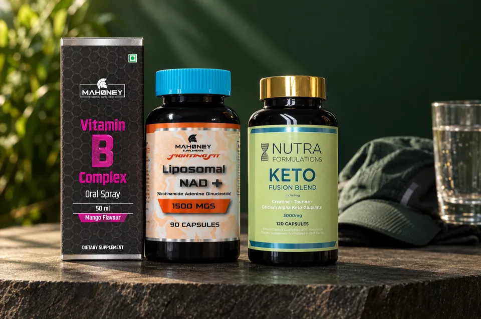 Vitamin B complex, Liposomal NAD Plus and Keto Fusion on a dark stone plinth in morning light