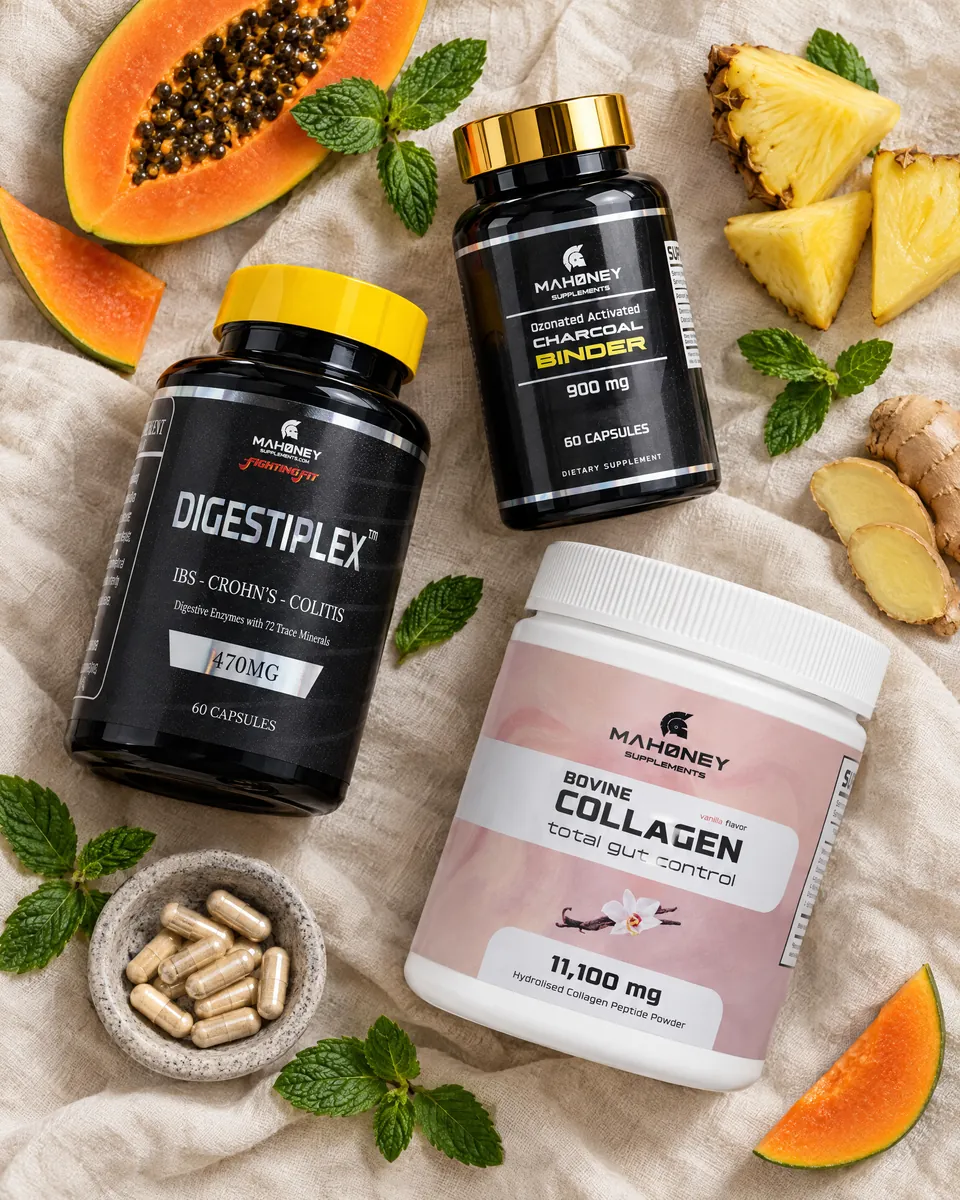 The three Gut Protocol products on linen with papaya, pineapple and fresh mint